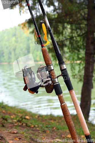 Image of two spinnings with baits