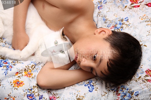 Image of boy with cat