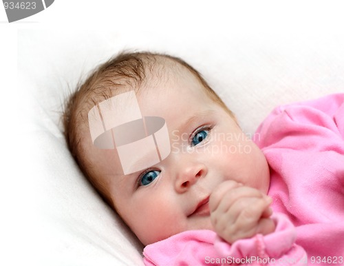 Image of smiling newborn baby girl