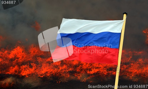 Image of russian flag on fire background