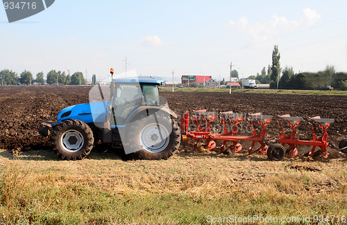 Image of tractor with plough