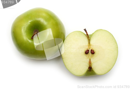 Image of whole and sliced green apples
