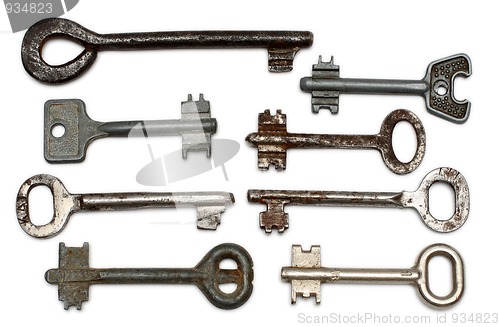 Image of eight old rusty keys