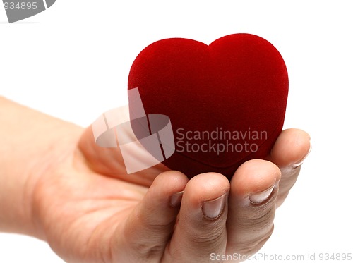 Image of man's hand gidting heart