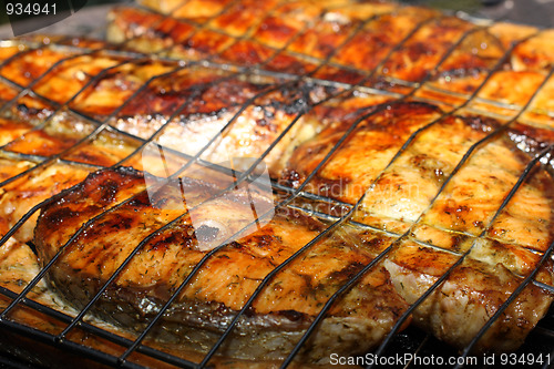 Image of Salmon cooking on grill