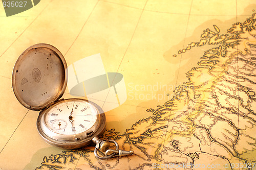 Image of Ancient map with old silver watch