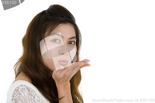 Image of woman blowing a kiss