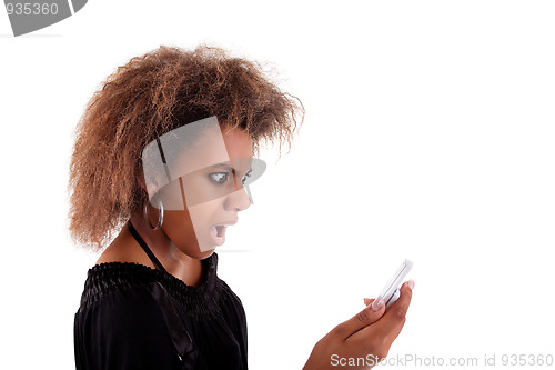 Image of Beautiful black woman angry on the phone