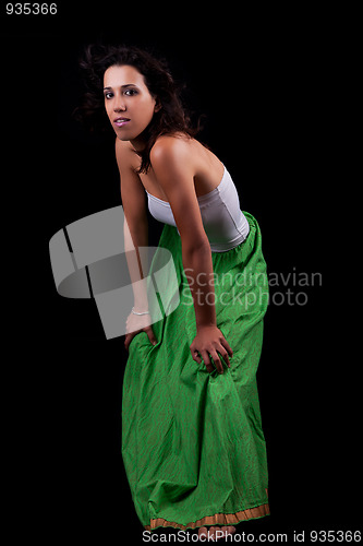 Image of young and beautiful woman, with her hair in the wind