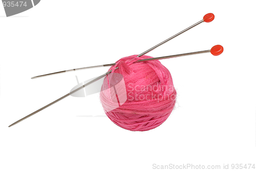 Image of Pink clew and knitting needles isolated on white