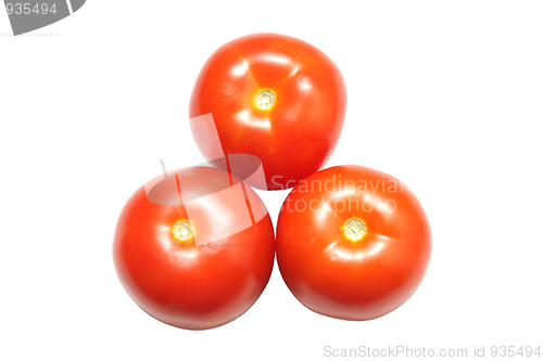 Image of Three ripe tomatoes isolated on white