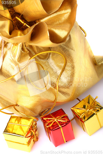 Image of Golden bag with gift boxes