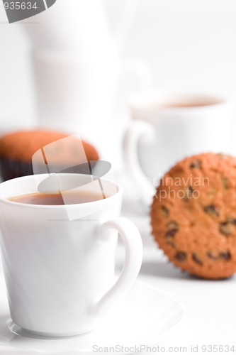 Image of cups of coffee and muffins