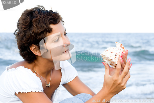 Image of woman with a cockleshell