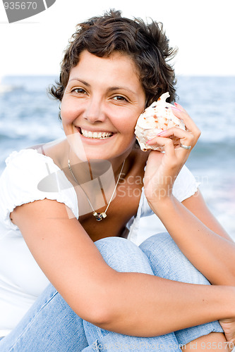 Image of woman with a cockleshell