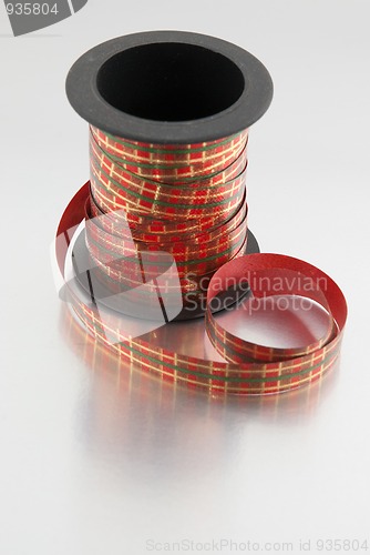 Image of Roll of red, green and gold ribbon