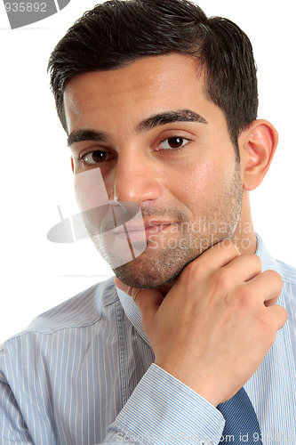 Image of Confident businessman thinking