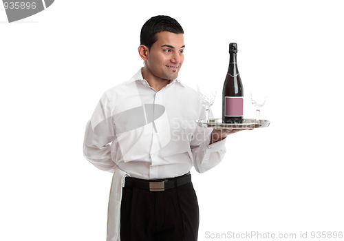 Image of Waiter or servant looking at wine product