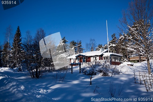 Image of cottage in snow