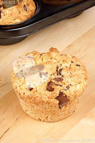 Image of Chocolate chip and pine nut muffin