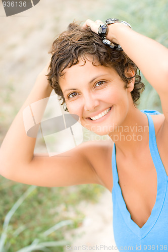 Image of  attractive brunet woman in blue