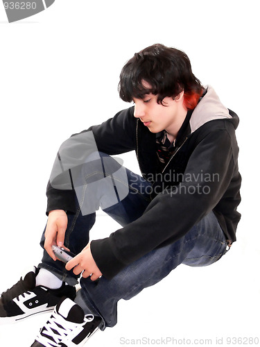 Image of Teen boy sitting  