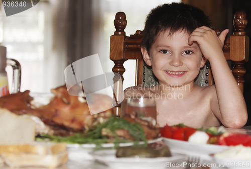 Image of Little boy at table