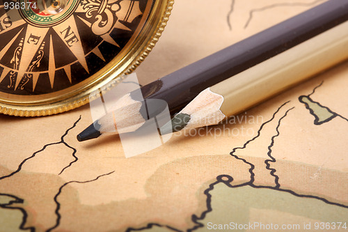 Image of Compass and pencils on old map