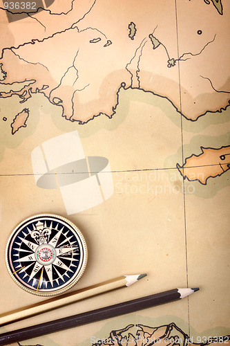 Image of Compass and pencils on the map