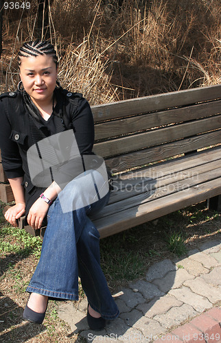 Image of Beautiful Asian girl with braids