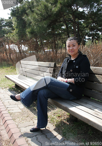 Image of Beautiful Asian girl with braids