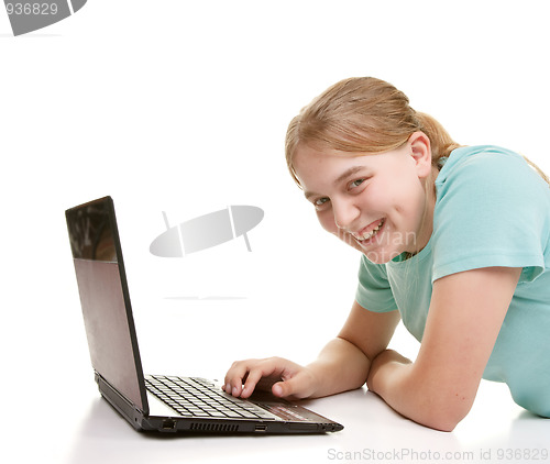 Image of teenager using a notebook