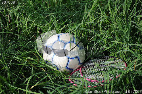 Image of Ball, Sunglasses and Badminton Rackets