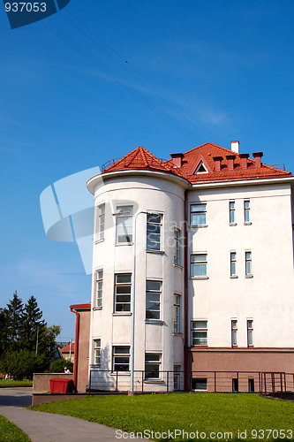 Image of building with a red tile roof