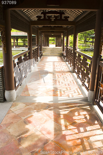Image of Traditional Chinese architecture, long corridor in outdoor park 