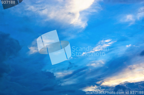 Image of Colorful dramatic sky with clouds at sunset