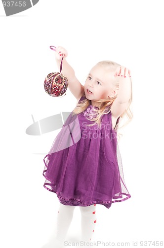 Image of Studio shot of baby girl in gala dress