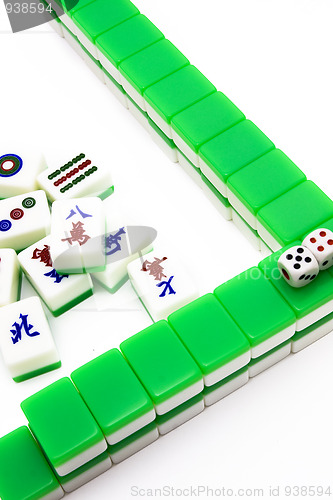 Image of Mahjong tiles aligned and two dices 