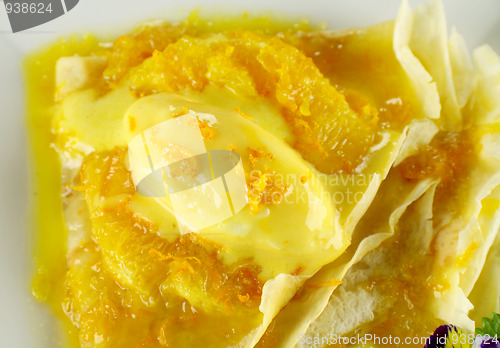 Image of Orange Crepes With Ice Cream