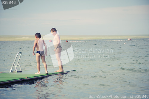 Image of Boys on pier