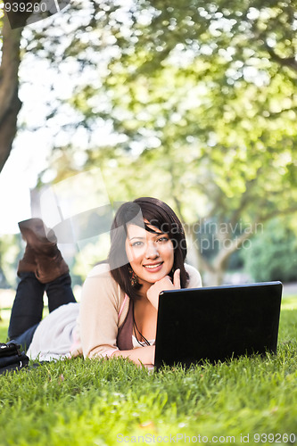 Image of Mixed race college student with laptop