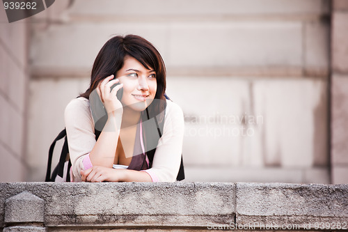 Image of Mixed race student on the phone