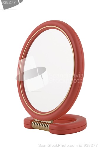 Image of beauty mirror with red frame and handle