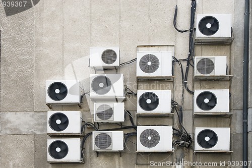 Image of air conditioner machines on wall