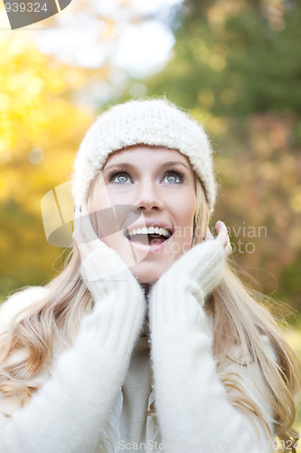 Image of Beautiful autumn woman