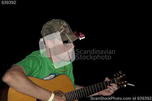 Image of Man Playing Guitar