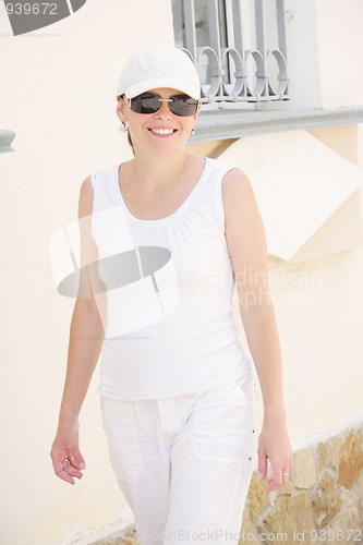 Image of Smiling woman in white