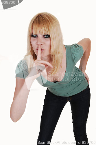 Image of Girl gesturing silent.