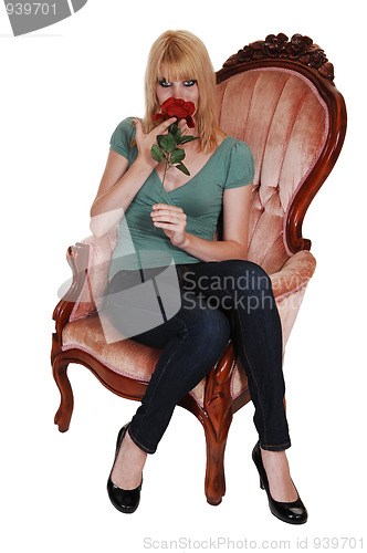 Image of Young girl in armchair.