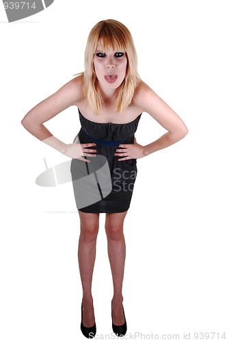 Image of Girl shoing tongue.